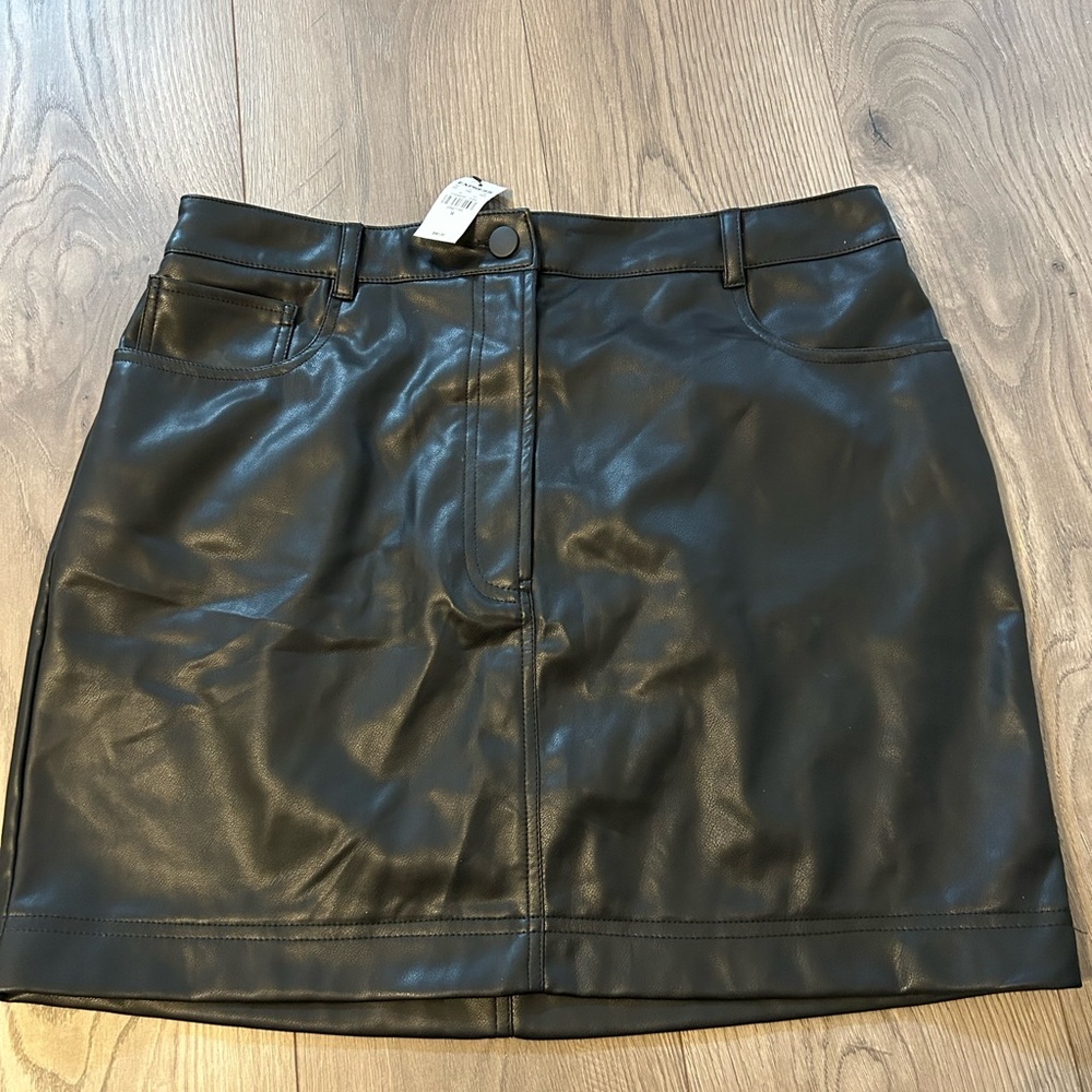 Express black pleather mini skirt. Size 14. NWT